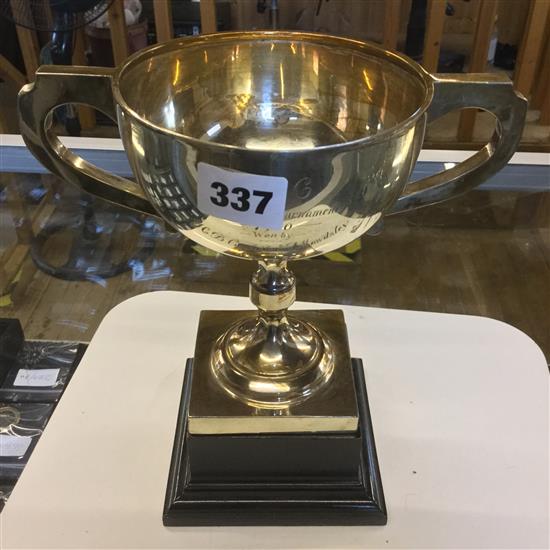 A large two handled trophy cup